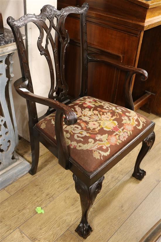 A pair of 19th century mahogany elbow chair, in Chippendale manner